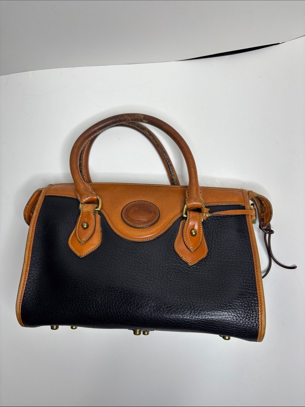 Dooney & Bourke Black Pebbled Leather Satchel with Tan Trim